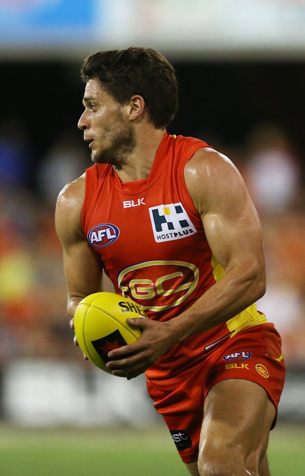 AFL 2015 NAB Challenge - Gold Coast v Brisbane Dion Prestia of the suns in action during the 2015 NAB Challenge Week 4 match between the Gold Coast Suns and the Brisbane Lions at Metricon Stadium, Gold Coast on March 20, 2015. (Photo: Jason O'Brien/AFL Media)